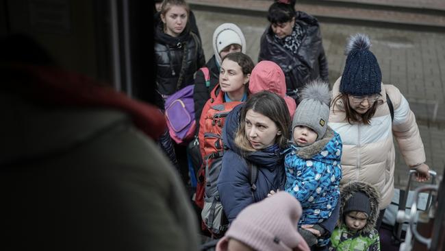 While men stay behind to fight, women flee Ukraine with their children. Picture: Getty