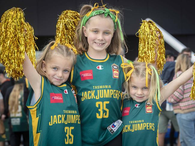 Mabel 6, Ivy 8 and Elsie Parker of Hobart at the JackJumpers grand final series against the Sydney Kings at MyState Bank Arena. Picture: Chris Kidd