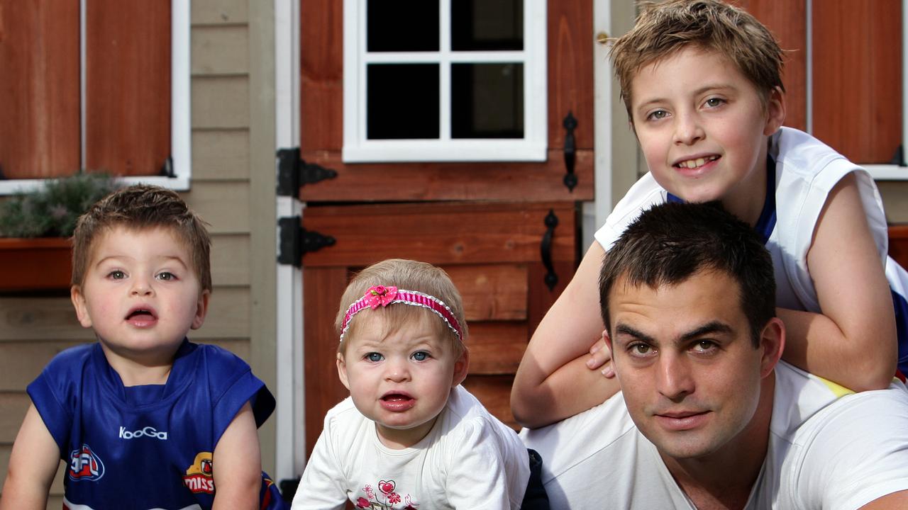 Brian Lake with his children before his 150th game in 2010.