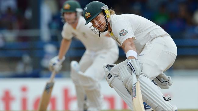 Shane Watson batting with Michael Clarke in 2012. AFP PHOTO/Stan HONDA Pic. Afp