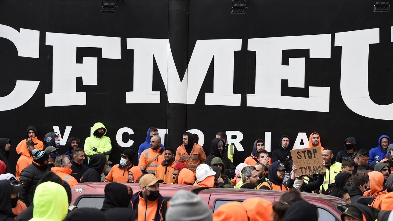 The crowd outside the Elizabeth St headquarters continued to grow on Monday afternoon. Picture: NCA NewsWire / Andrew Henshaw