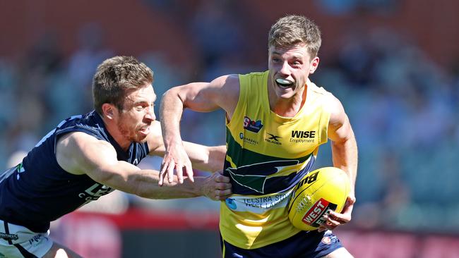 SANFL - Sunday, October 11th, 2020 - Preliminary Final - Eagles v South Adelaide at the Adelaide Oval. South's Joel Cross tries to stop Eagles Jacob Wehr Picture: Sarah Reed