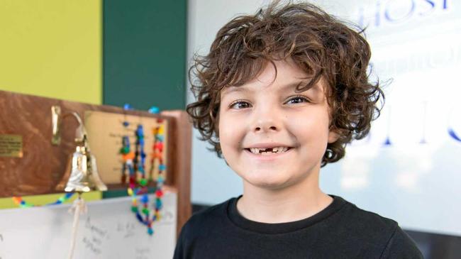 MILESTONE MOMENT: Hayden Lee rings the 'last chemo bell' after completing more than three years of treatment for leukaemia. Picture: Emma Murray