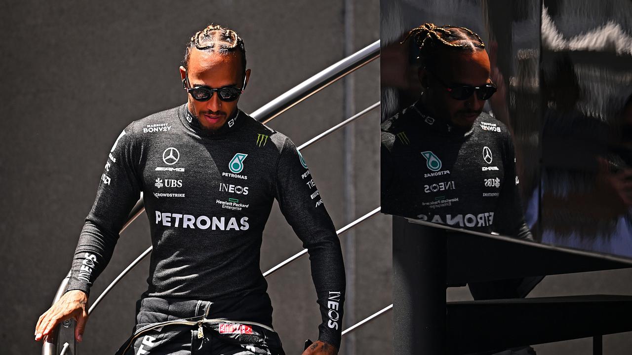 BARCELONA, SPAIN - MAY 21: Lewis Hamilton of Great Britain and Mercedes walks in the Paddock during practice ahead of the F1 Grand Prix of Spain at Circuit de Barcelona-Catalunya on May 21, 2022 in Barcelona, Spain. (Photo by Clive Mason/Getty Images)