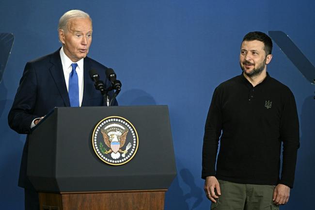 US President Joe Biden corrected himself after accidentally introducing  Ukraine's President Volodymyr Zelensky (R) as Russia's President Vladimir Putin during the Ukraine Compact initiative on the sidelines of the NATO summit in Washington