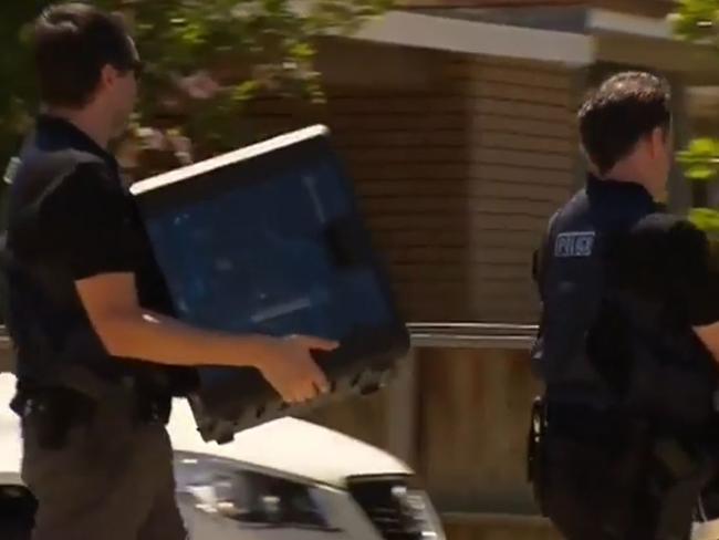 Police remove computers from the Perth home of alleged Claremont murders suspect Bradley Robert Edwards. Picture: Seven News.