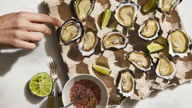 Oysters with coriander, lime and white pepper mignonette. Picture: Benito Martin and Jess Johnson