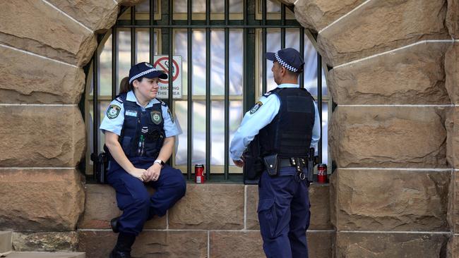 Quarantined guests at the Intercontinental Hotel in Sydney under guard by NSW Police.