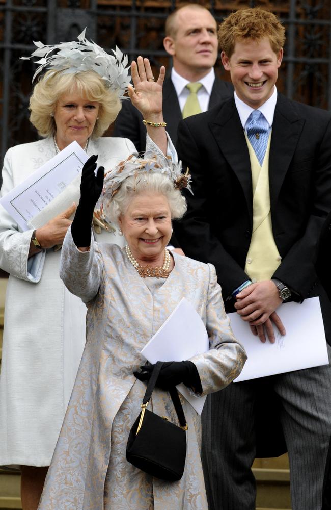 2008: The Queen pictured with Camilla and Prince Harry as they leave St George's Chapel in Windsor on May 17, 2008 after the marriage of Peter Phillips and Autumn Kelly. Picture: Ian McIlgorm/AFP