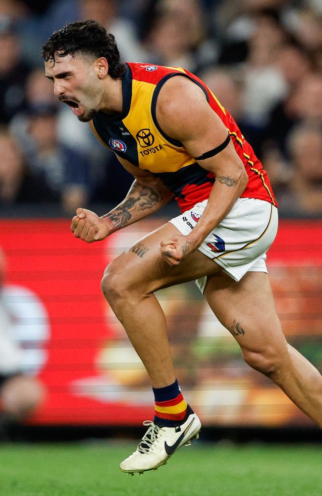 Izak Rankine celebrates a last quarter goal against the Blues. Picture: Dylan Burns/AFL Photos