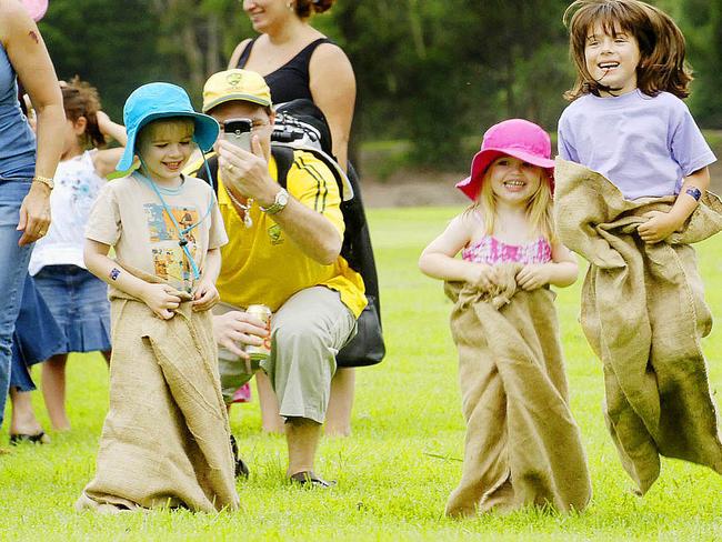 Sack racing as a part of Lane Cove Australia Day celebrations. Picture: John Appleyard