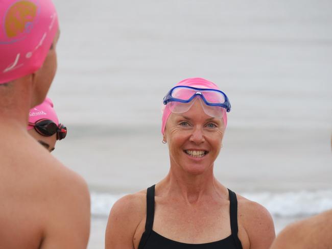 Members of the Peninsula Ocean Swimmers group get ready to attempt to swim around Lion Island. Picture: Richard Noone