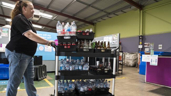 Lifeline Darling Downs business services manager Angela Klein processes a customers recyclables at Lifeline's Perth St Containers for Change depot, Monday, May 11, 2020. Picture: Kevin Farmer