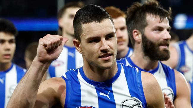 MELBOURNE, AUSTRALIA - JUNE 29: Luke Davies-Uniacke of the Kangaroos thanks the crowd after his 100th match during the 2024 AFL Round 16 match between the North Melbourne Kangaroos and the Western Bulldogs at Marvel Stadium on June 29, 2024 in Melbourne, Australia. (Photo by Michael Willson/AFL Photos via Getty Images)