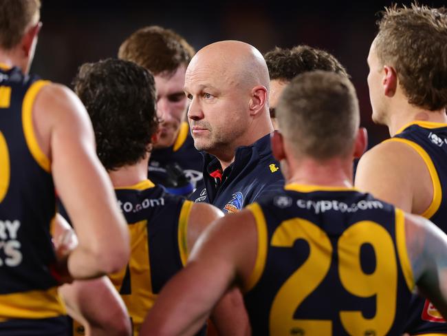 Matthew Nicks addresses his troops during the three-quarter time break on Thursday. Picture: Sarah Reed/AFL Photos via Getty Images.