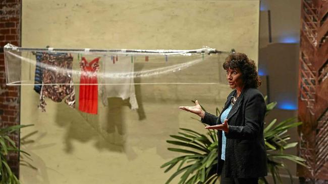 WATER TEST: Liana Wynne on  Shark Tank  where she sought an investor for the Clothesline Brolly. (INSET) Investor Andrew Banks tests out Liana's product.