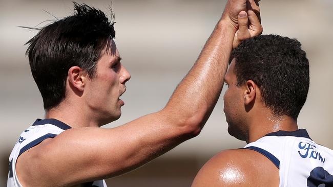 Ollie Henry (left) celebrates one of his four goals. Picture: Kelly Defina/Getty Images