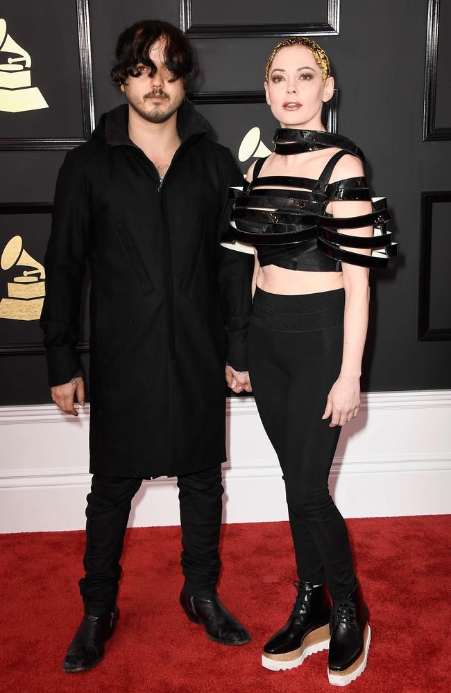 Jordan ‘B00ts’ Asher and Rose McGowan attend The 59th GRAMMY Awards at STAPLES Center on February 12, 2017 in Los Angeles, California. Picture: AFP