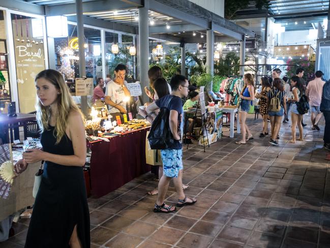 Young tourists shopping at a Christmas market in Canggu, Bali. Picture by Graham Crouch/The Australian