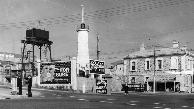 To the left is the water tank used to supply water to steam trains. This is Semaphore in 1961.