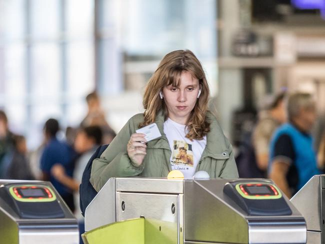 A NEW operator for Victoria's troubled Myki system will be announced today. Commuters use Myki cards at Flinders Street Station. Picture: Jake Nowakowski