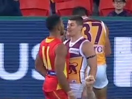 Dayne Zorko and Touk Miller clash.