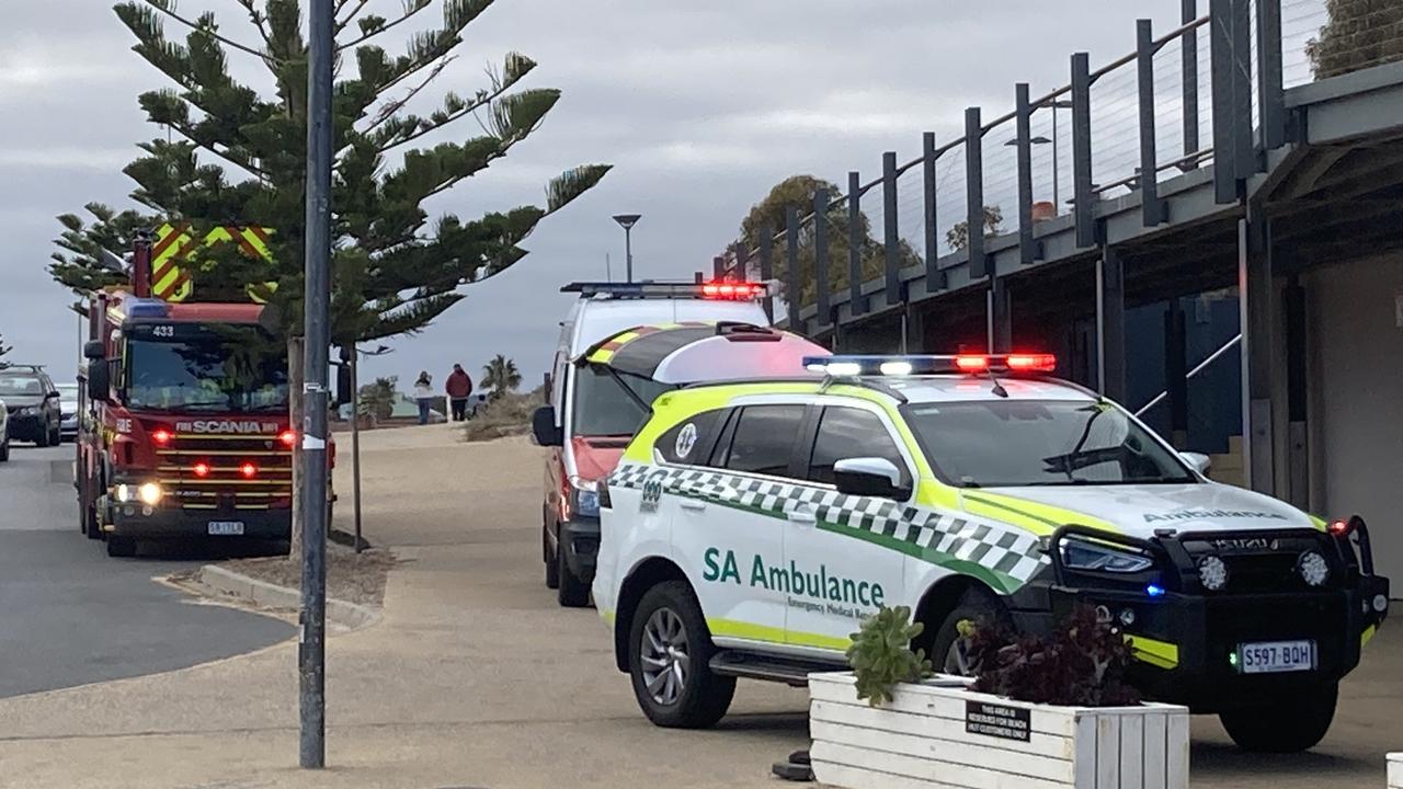 Emergency services at Port Noarlunga beach after a man was attacked by a shark near the jetty. Picture: Jeff Anderson/First on Scene Media
