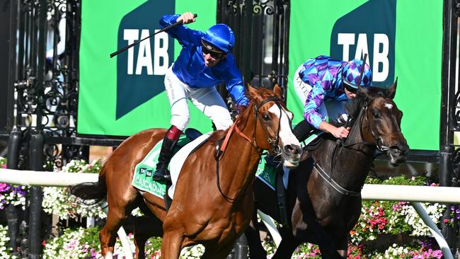 Ben Melham sits high in the irons after Cascadian won the Group 1 Australian Cup at Flemington. Picture: Vince Caligiuri/Getty Images