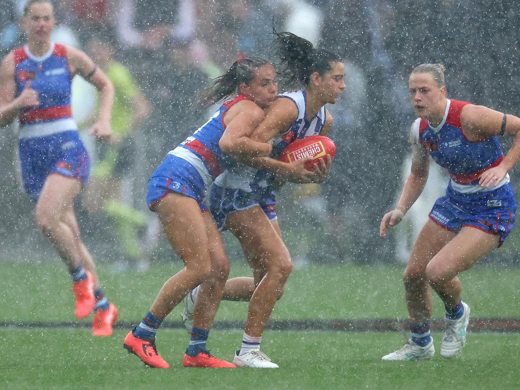 The rain pours down at Arden Street. Picture: Getty Images