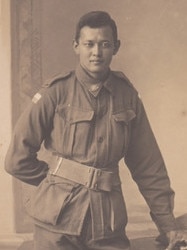 Caleb Shang wearing his war medals.