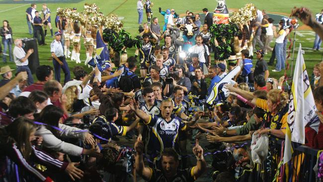 Townsville, September 18, 2004. The Cowboys leave the field after winning the NRL Rugby League Semi Final, Brisbane Bronco's v North Queensland Cowboys match at Dairy Farmers Stadium. The Cowboys won 10-0, beating the Broncos for the first time ever. (AAP Image/Action Photographics/Colin Whelan)