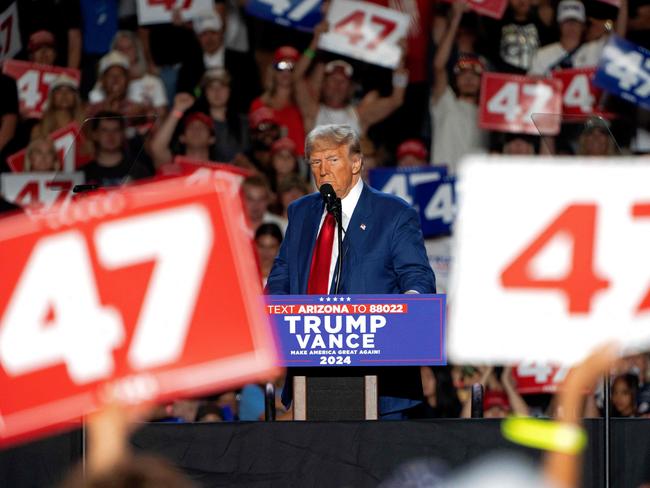 (FILES) Former US President and Republican presidential candidate Donald Trump speaks during a campaign rally at Mullet Arena in Tempe, Arizona on October 24, 2024. Donald Trump won the state of Arizona in this week's US presidential election, US TV networks projected on November 9, 2024, completing the Republican's sweep of all seven swing states. (Photo by Rebecca NOBLE / AFP)