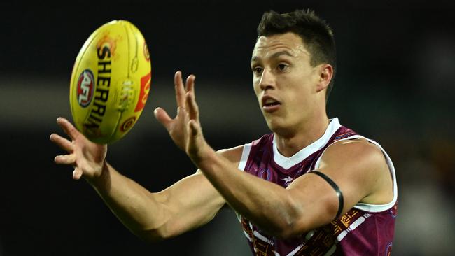 LAUNCESTON, AUSTRALIA - MAY 22: Hugh McCluggage of the Lions takes a mark during the round 10 AFL match between the Hawthorn Hawks and the Brisbane Lions at University of Tasmania Stadium on May 22, 2022 in Launceston, Australia. (Photo by Steve Bell/Getty Images)