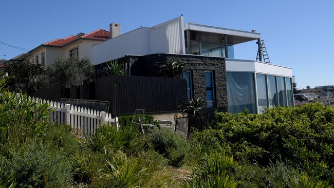 John Ibrahim’s Dover Heights home during Tuesday’s police operation. John has not been charged. Picture: AAP Image/Brendan Esposito