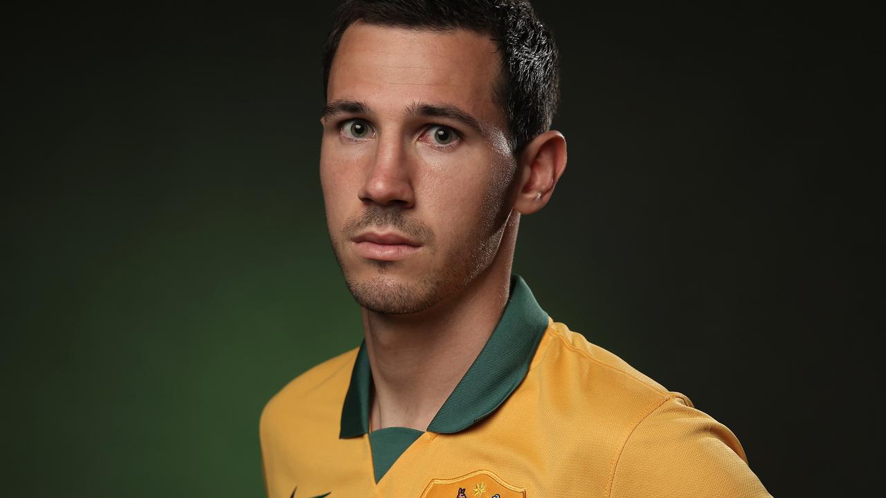 SYDNEY, AUSTRALIA - MAY 23: Ryan McGowan of the Socceroos poses during an Australian Socceroos portrait session at the Intercontinental on May 23, 2014 in Sydney, Australia. (Photo by Cameron Spencer/Getty Images)