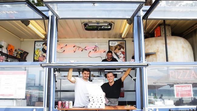 Elaborate food trucks are all the rage, such as the Happy as Larry Sydney truck seen here in Manly. Picture: Braden Fastier