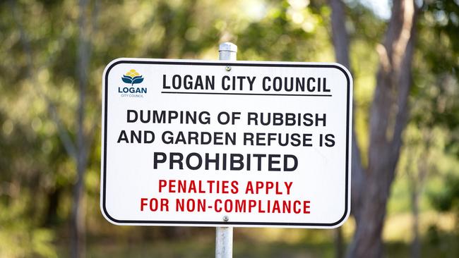 Logan City Council rubbish dumping sign along Bardon Road, Berrinba, Thursday, July 11, 2019 (AAP Image/Richard Walker)