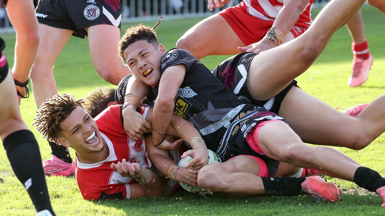 Jac Finigan of PBC SHS and Adaquix Luke of Marsden SHS in the Langer Trophy Grand Final. Picture: Liam Kidston