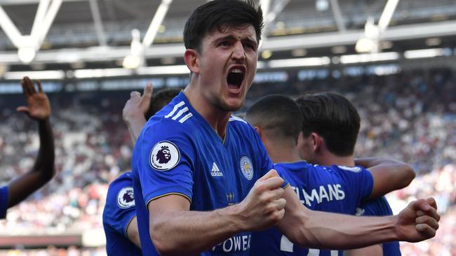 Leicester City's English defender Harry Maguire celebrates during the English Premier League football match between West Ham United and Leicester City at The London Stadium, in east London on April 20, 2019. (Photo by Ben STANSALL / AFP) / RESTRICTED TO EDITORIAL USE. No use with unauthorized audio, video, data, fixture lists, club/league logos or 'live' services. Online in-match use limited to 120 images. An additional 40 images may be used in extra time. No video emulation. Social media in-match use limited to 120 images. An additional 40 images may be used in extra time. No use in betting publications, games or single club/league/player publications. /