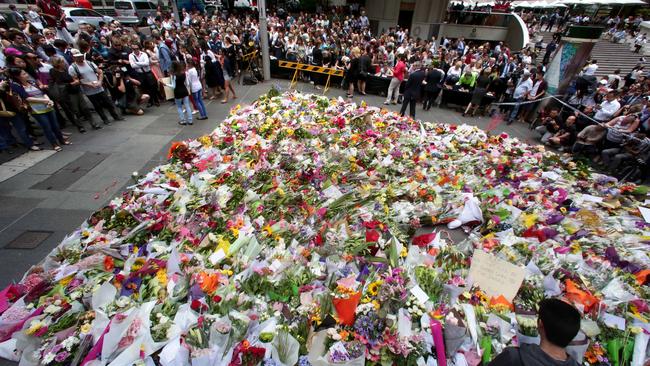 The amazing memorial to Katrina Dawson And Tori Johnson in Martin Place. Picture: Adam Ward