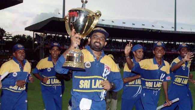 Asanka Gurusinha holds the trophy after Sri Lanka beat Australia in the Singer World Series in 1996. Picture: Glenn Barnes