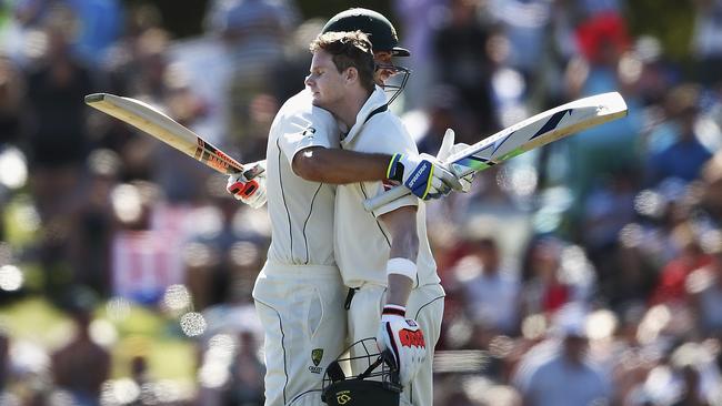 CHRISTCHURCH, NEW ZEALAND - FEBRUARY 21: Steve Smith of Australia is congratulated by Joe Burns of Australia after reaching his century during day two of the Test match between New Zealand and Australia at Hagley Oval on February 21, 2016 in Christchurch, New Zealand. (Photo by Ryan Pierse/Getty Images)