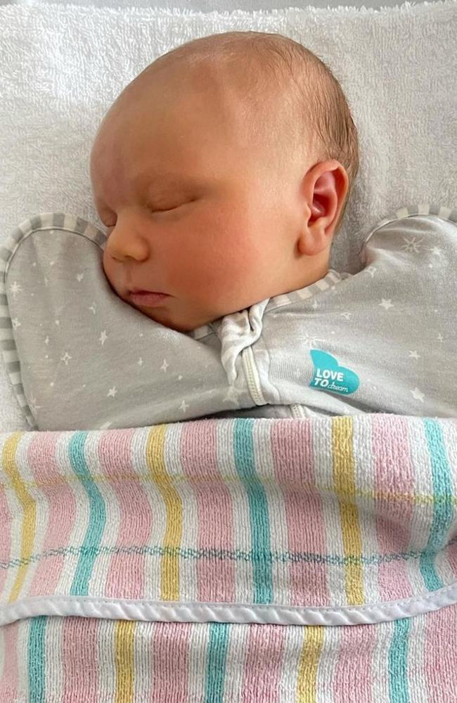 Simon Pryce and Lauren Hannaford share a photo of Asher. Picture: Instagram