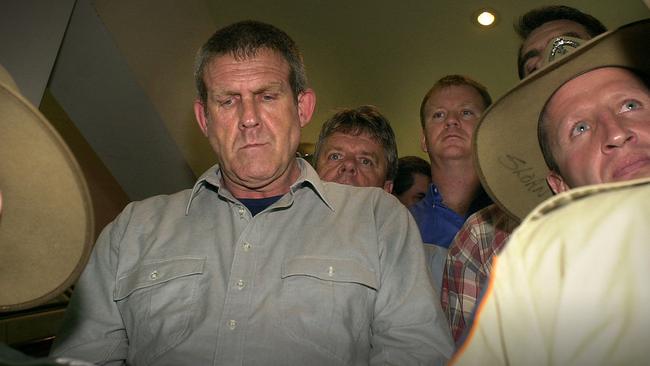 Bradley Murdoch arrives under police escort at Darwin Airport to face murder charges in relation to the death of British backpacker Peter Falconio. Picture: Patrina Malone