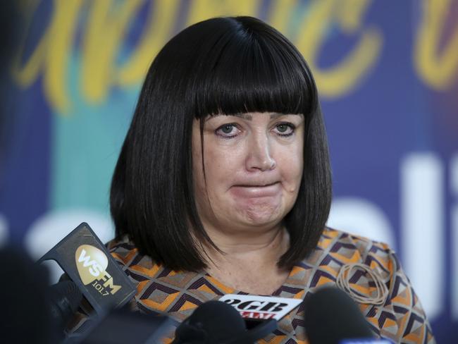 FILE - In this May 17, 2019, file photo, Rugby Australia Chief Executive Raelene Castle announces that Rugby Australia has terminated star fullback Israel Folau's contract in Sydney. Castle resigned from her position Thursday, Apri. 23, 2020, after she said the board of directors made it clear that it would not allow her to continue in her top management role. Rugby Australia said Castle informed Rugby Australia chairman Paul McLean of her decision. (AP Photo/Rick Rycroft, File)