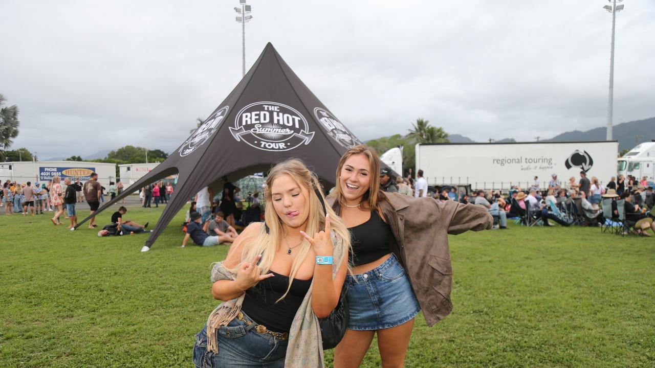 Friends Ellie Rachrad and Ellie Rodgers enjoy the Cairns edition of the Red Hot Summer Tour, held at the Cairns Showgrounds on May 25 2024. Picture: Angus McIntyre