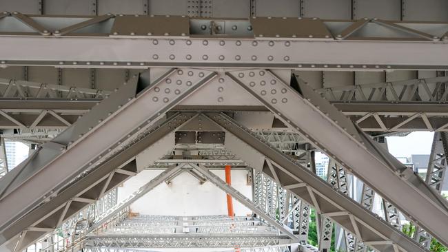 Work to fix the bridge has been occurring under the deck on the Kangaroo Point side. Picture: BCC