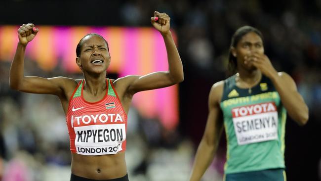 Kenya's Faith Chepngetich Kipyegon, left, celebrates as South Africa's Caster Semenya watches on. Photo: AP