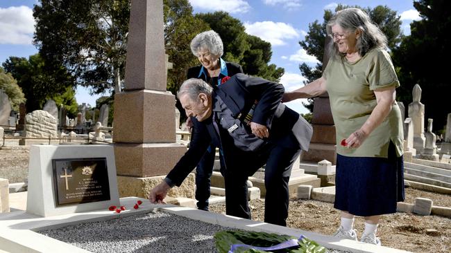 Family members of Private Andrew James Marshall at his graveside: Grandchildren Joy Parker, 89, Ron Wallace, 90, and Robyn Wallace, 73. Picture: Naomi Jellicoe