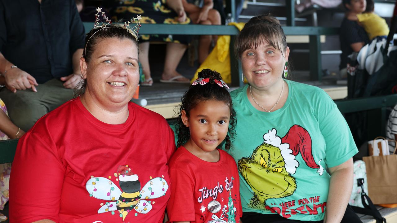 Avril Hendry, Florrie Tamwoy, 7, and Eliza Hendry at the Cairns Churches Joy to the World Community Carols, held at the Cairns Showgrounds. Picture: Brendan Radke